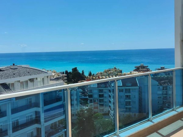 Zařízený mezonet apartmán se 3 ložnicemi a výhledem na moře Alanya - Tosmur - 1